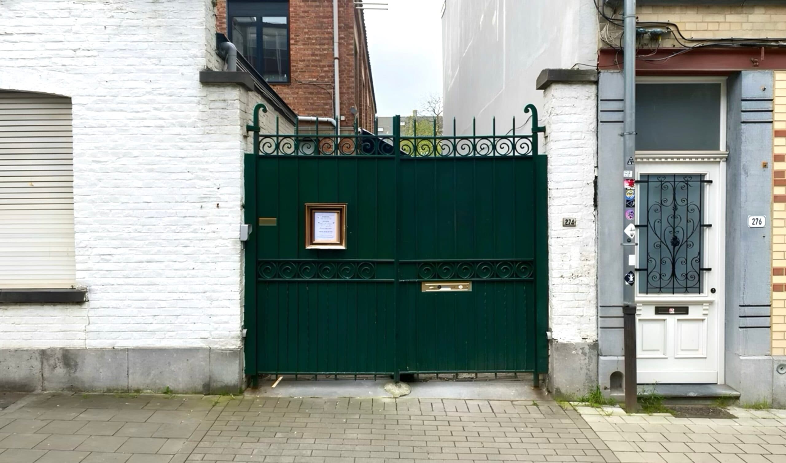 The green entrance gate at Forest Lighthouse